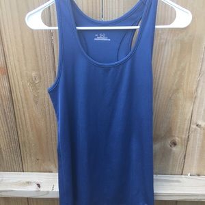 Several Under Armour tanks size Large